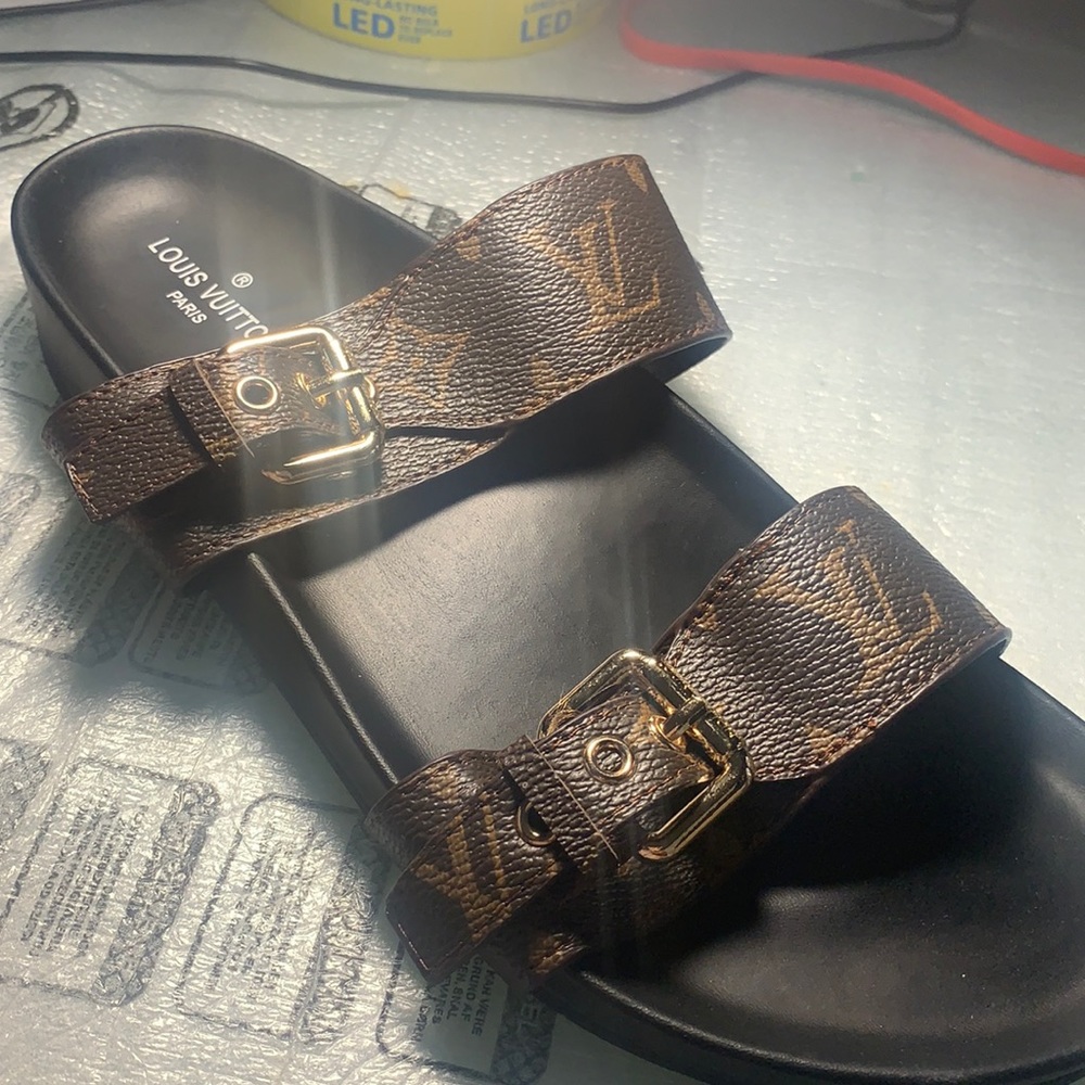 Louis Vuitton slippers never worn